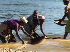 Locals Panning River Gravels-Africa